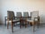 A striking set of six vintage dining armchairs by Dillingham Manufacturing Co. The clean architectural lines, tapered...