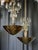 A pair of chandelier designed by Lisa Johansson-Pape for Orno, Finland. Circa 1950th. Perforated polished brass bawl with...