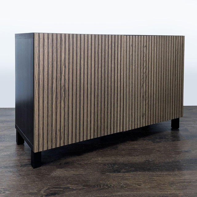 Two tone cabinet with slatted doors and adjustable interior shelving. Dimensions (in): 47W x 16D x 29H.