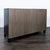 Two tone cabinet with slatted doors and adjustable interior shelving. Dimensions (in): 47W x 16D x 29H.