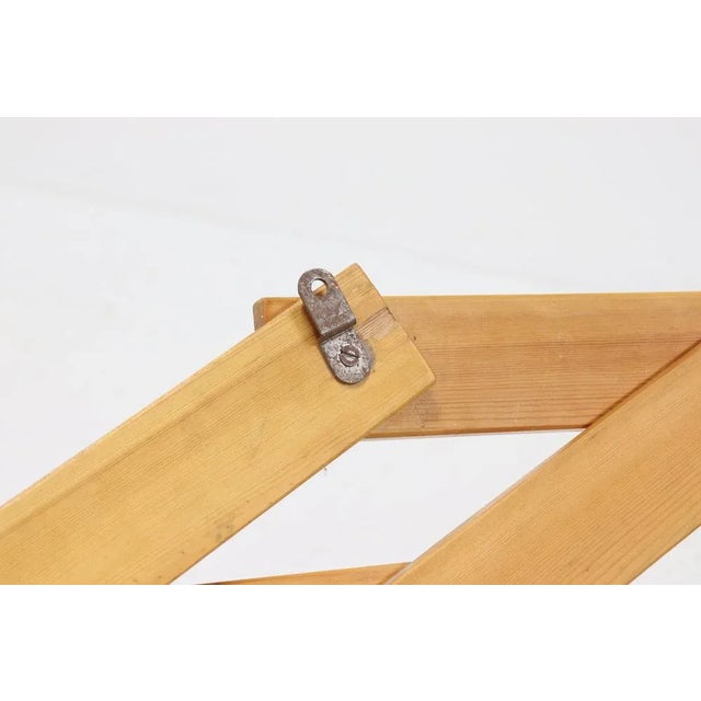 Scandinavian pine wall mounted coat rack from the 1970s
