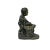 Presenting a charming bronze figurine depicting a child engaged in the traditional process of grinding, likely soybeans,...