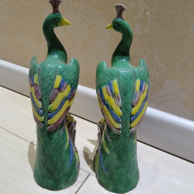 This charming pair of vintage porcelain peacocks brings a vibrant, decorative presence to any interior. Each bird is...