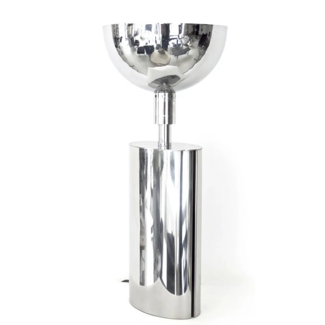 A French chrome-plated brass sculptural table lamp, circa 1970 with a removable white painted interior reflecting bowl...