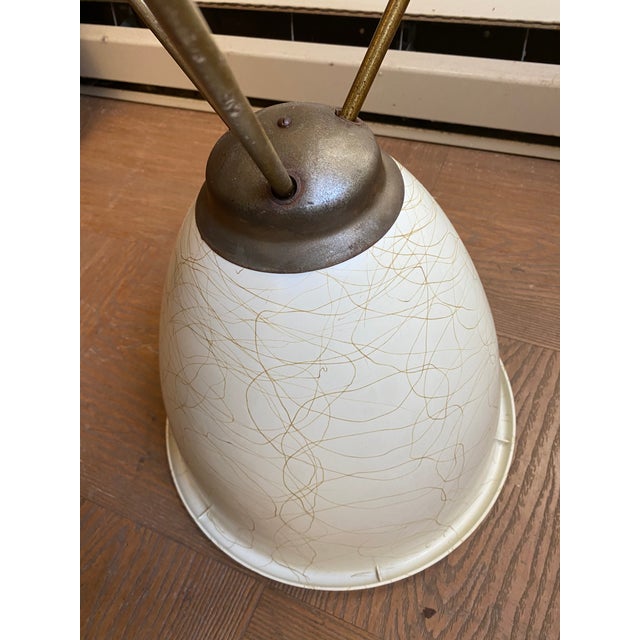 Nice mid-century Eames period bullet planter. Measures 22” tall and the planter bowl at its widest is 13”. It is plastic...