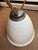 Nice mid-century Eames period bullet planter. Measures 22” tall and the planter bowl at its widest is 13”. It is plastic...
