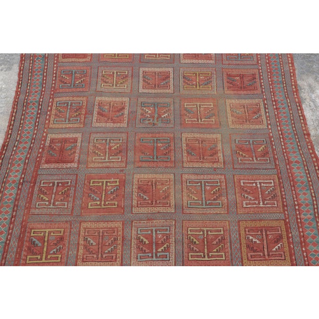 Handwoven in wool circa 1850-1875, this 4x6 antique Caucasian Verneh rug is a distinguished example of flatwoven tribal...