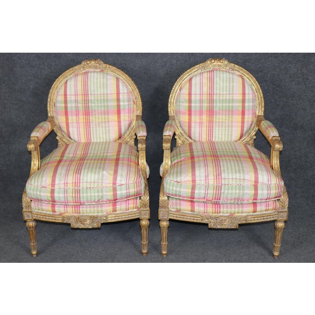 Dimensions: 40 inches high x 27 inches wide x 29 inches deep. Seat height 21.75 An exceptional pair of vintage Louis XVI...