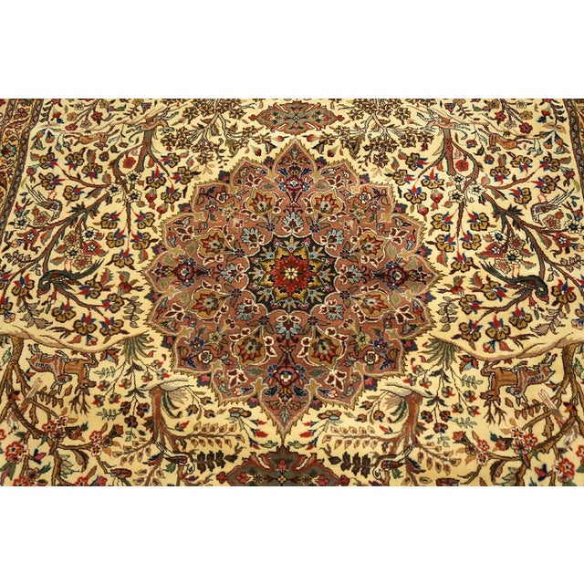 Mid 20th Century Persian Tabriz Carpet ( 5'9" x 9' - 175 x 275 ) A mid-20th-century Tabriz carpet, The piece measures...