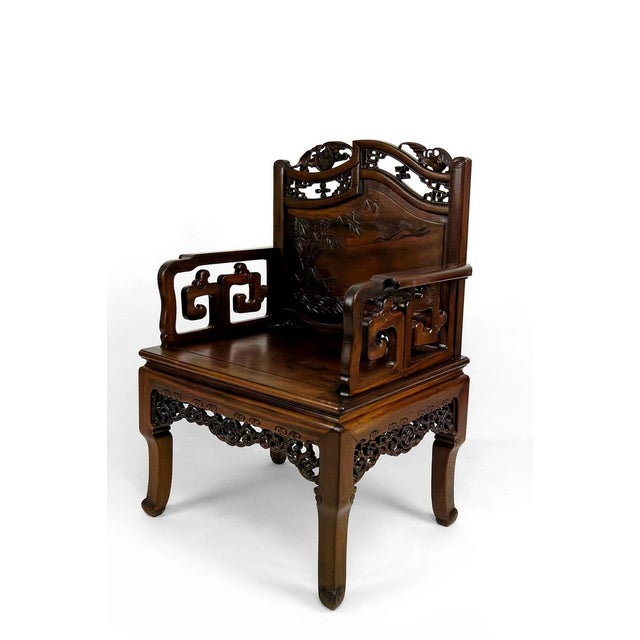Superb set of 4 important Asian armchairs in carved Chinese mahogany wood (toona sinensis). Carved with plant and animal...