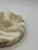 Elegant round marble soap dish by Waterworks, featuring dramatic natural cream and warm beige veining. Sculpted with a...