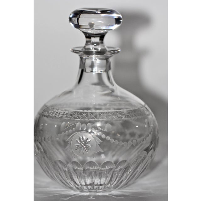 A Beautiful Hand Cut Crystal Decanter with Stopper by William Yeoward in the classic pattern, "pearl". The Decanter is...