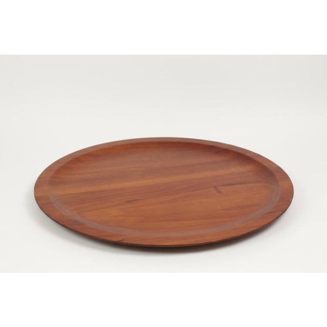 Beautiful grain and patina, vintage round walnut wood tray with slightly raised lip was handcrafted in the 1980s. Ideal as...