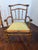 A stylish pair of faux bamboo armchairs by The Wicker Works, San Francisco, designed in the refined California coastal and...