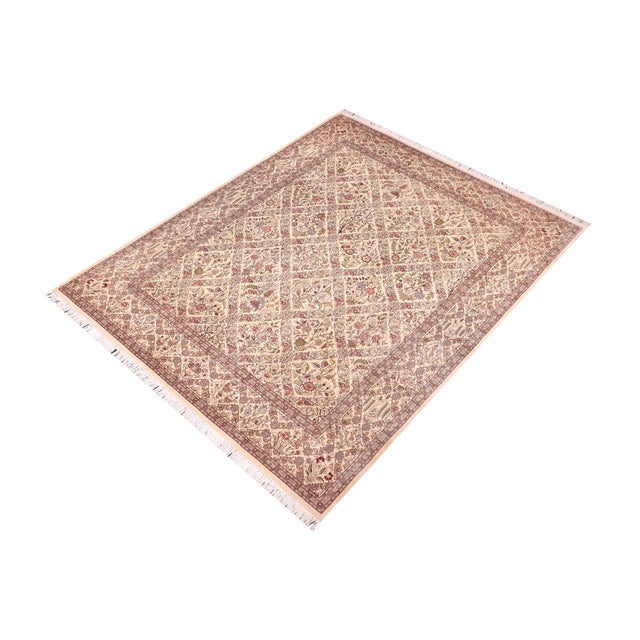 Designed with mesmerizing intricacy and gorgeous color palette, this hand-knotted masterpiece demonstrates the beauty and...