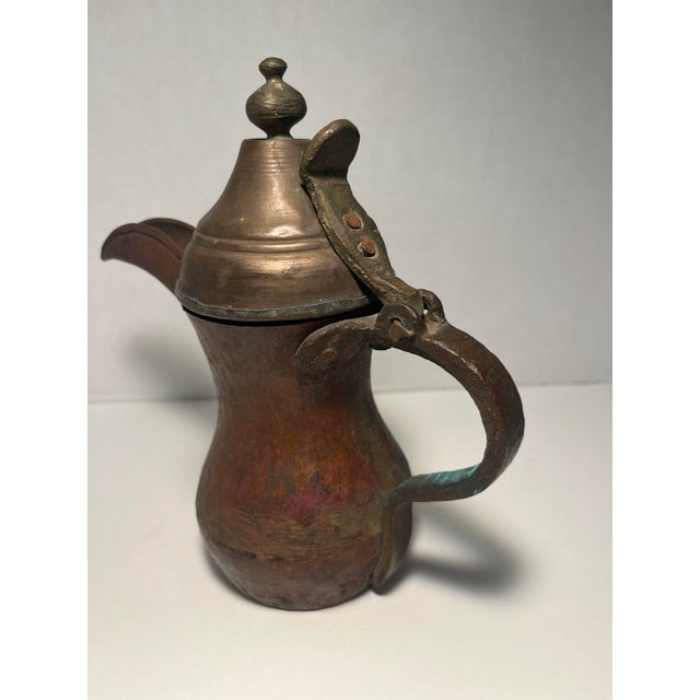 19th Century Antique Brass Islamic Dallah Hand Hammered Coffee Pot Aprox. dimensions: 7"H x 3" diameter at the bottom Good...