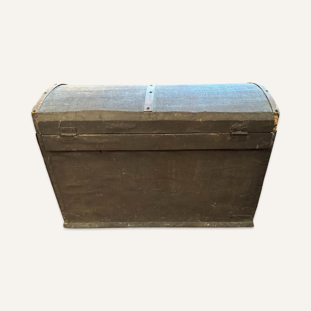 Charming 19th century dome top child’s trunk with handles and Santa and puppy/cat decoration inside. The single interior...