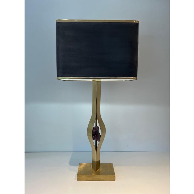This large and beautiful sculptural lamp is made of brass with an amethyst stone in its center. It is a work of the famous...