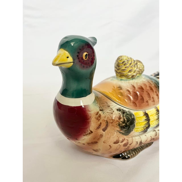 Add a charming touch of vintage whimsy to your collection with this beautifully hand-painted ceramic pheasant tureen....