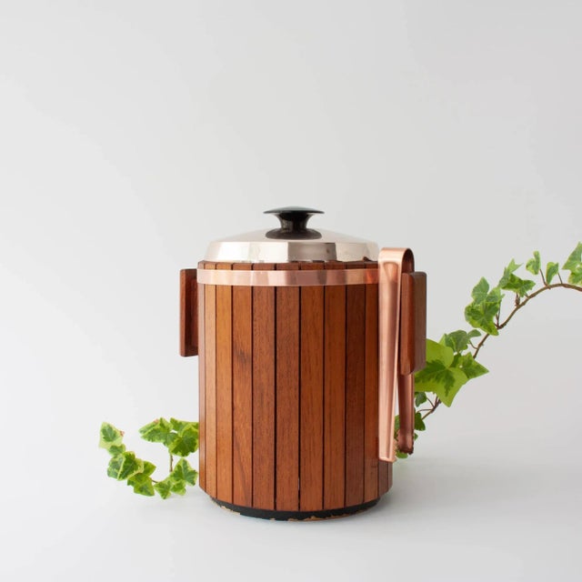 This authentic Scandinavian ice bucket, made in Denmark during the 1960s, showcases the best of mid-century modern design....