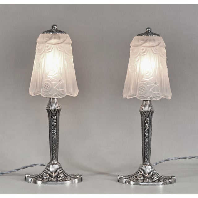 Etablissement Jean Gauthier A pair of French art deco lamps made circa 1925-1935. The nickel-plated bronze or solid brass...