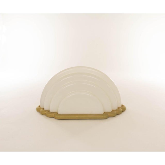 Kumo table lamp designed by Kazuhide Takahama and produced by Sirrah in 1985. The model consists of an opaline glass shade...