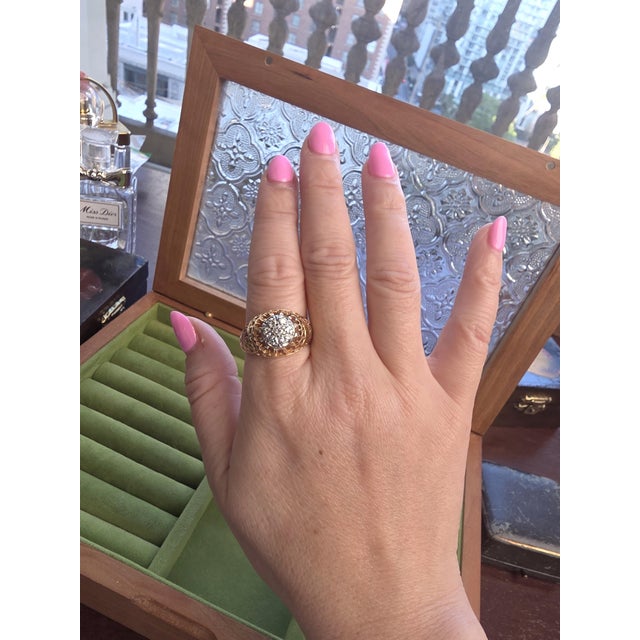 Diamond Vintage Estate Diamond Cluster Ring 14K Two-Tone Gold Circa 1970s A bold and beautifully detailed 1970s estate...