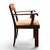 An Art Deco armchair dating from the first half of the 20th century, crafted from veneered wood with a beautiful, natural...