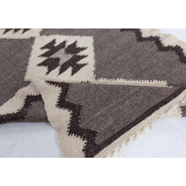 European Folk Stamverband II goat hair rug by Doris Leslie Blau. Size: 4'5" × 7'0" (134 × 213 cm). This stunning...