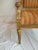 Vintage Isenhour giltwood accent chair with detailed carvings and nailhead trim. Striped upholstery is original. Minimal...
