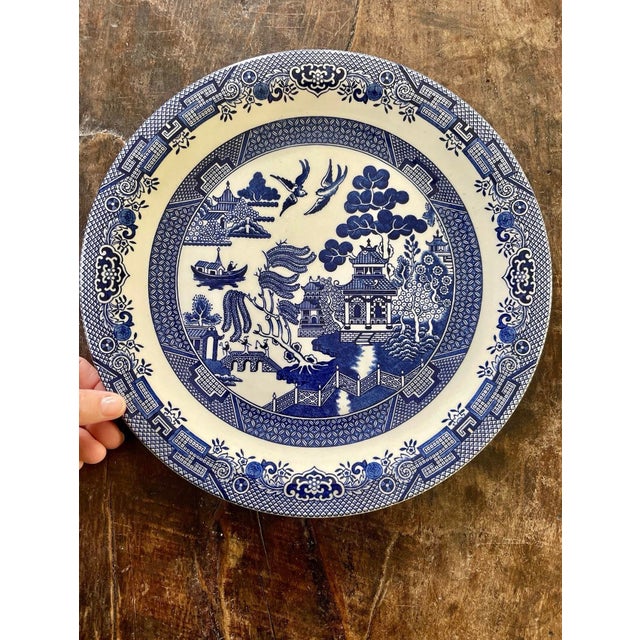 Fantastic large English round platter , presented in a blue willow pattern, on a crisp, white with a rich royal blue. This...