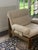 Armchair and footstool fully restored and reupholstered in an elegant, slightly heathered cream fabric with fully...