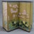 A Chinese Floral Decorated and Ebonized Table Screen 20thC Measures - 35.25''H x 69.5''W x .75''D; panels each 35.25''H x...