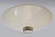 Elegant flush mount ceiling light comes with a disc shaped enameled metal reflector with circular perforations of...