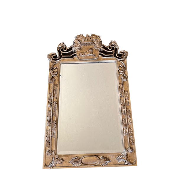 Dramatic large-scale, heavy, gilt mirror featuring exceptionally ornate Baroque-inspired carving and a striking reclining...