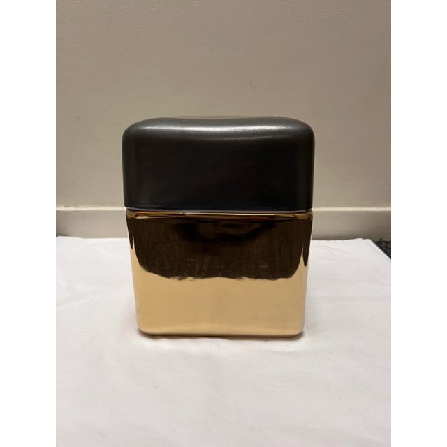 Stunning modern cubist storage box made from Porcelain in a beautiful duel finish . Top is bronze finish and the bottom is...
