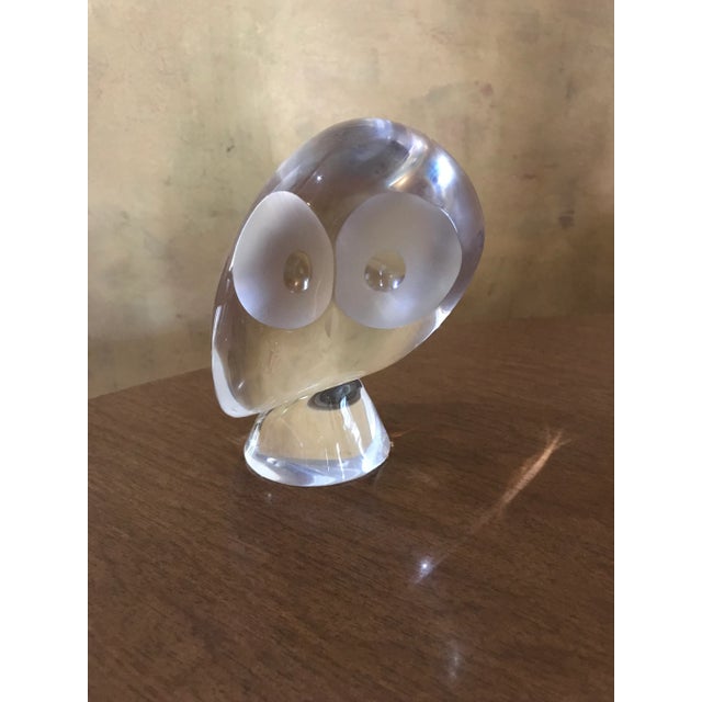 Beautiful clear crystal sculpture of an owl . Heavy and solid piece of art. Signed on the bottom. Made by the Steuben...