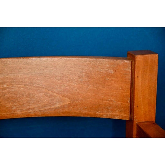 Elegant and sculptural, this 1970s armchair is bright and very comfortable. The minimalist design features crisp lines and...