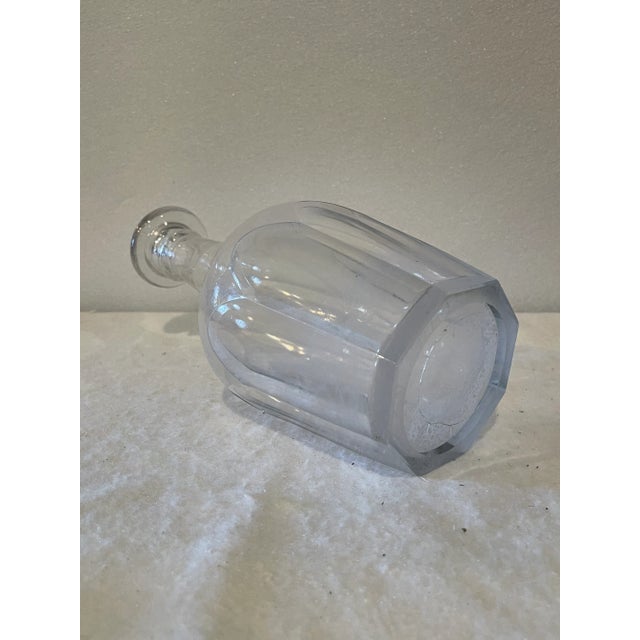 Early 1800s, pre 1830 Handblown glass decanter with polished pintail mark and panel cut decoration.