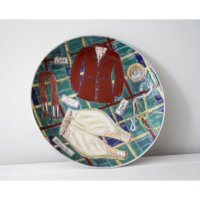 Cheeky, vintage, Equestrian Hunt themed plate! Various riding tack is labeled and playfully scattered about against a...