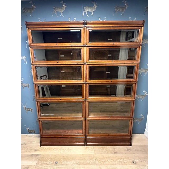 A magnificent antique mahogany Globe Wernicke bookcase in perfect and completely original condition. What makes this Globe...