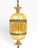 A striking vintage Hollywood Regency swag lamp featuring patterned clear glass, antiqued gold-tone metal trim, cascading...