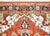 A chic late 20th century American hand-knotted Keristan rug with a Heriz-style pattern including a large central floral...