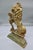 A large and beautifully detailed hollow cast brass lion in the classic heraldic rampant pose — one paw resting on an...
