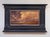 This oil on panel artwork captures the dramatic interplay of light and color in a Colorado sky, where swirling clouds...