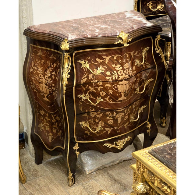 Bring timeless European elegance to your home with this exquisite French Louis XV-inspired commode. Crafted from...