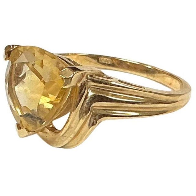 10k yellow gold Citrine ring. The dimensions are approximately 9.5 mm. Approximately 3 carats. Marked 10k. Approximate...