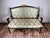 This elegant vintage Louis XVI style settee captures the refined symmetry and classical restraint associated with French...