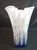 Add a touch of elegance to any room with this stunning handkerchief-style art glass vase. Featuring a mesmerizing mottled...