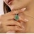 A perfect expression of love and elegance, this 925 Sterling Silver Emerald & Diamond Pendant showcases five finely cut...